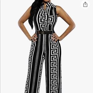 Black & white jumpsuit with gold belt.